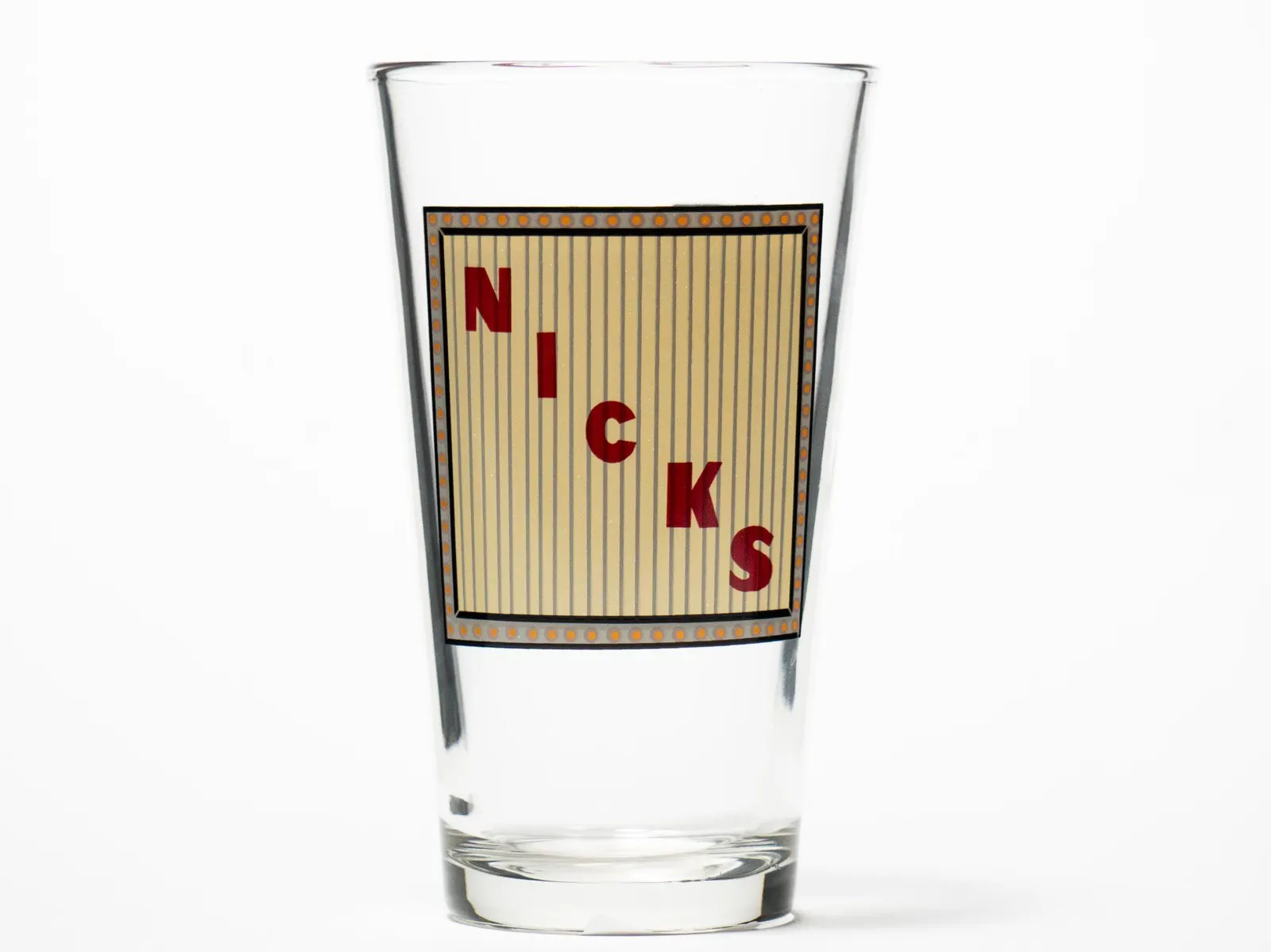 Printed glassware photographed front-on with the brand mark readable on a white set
